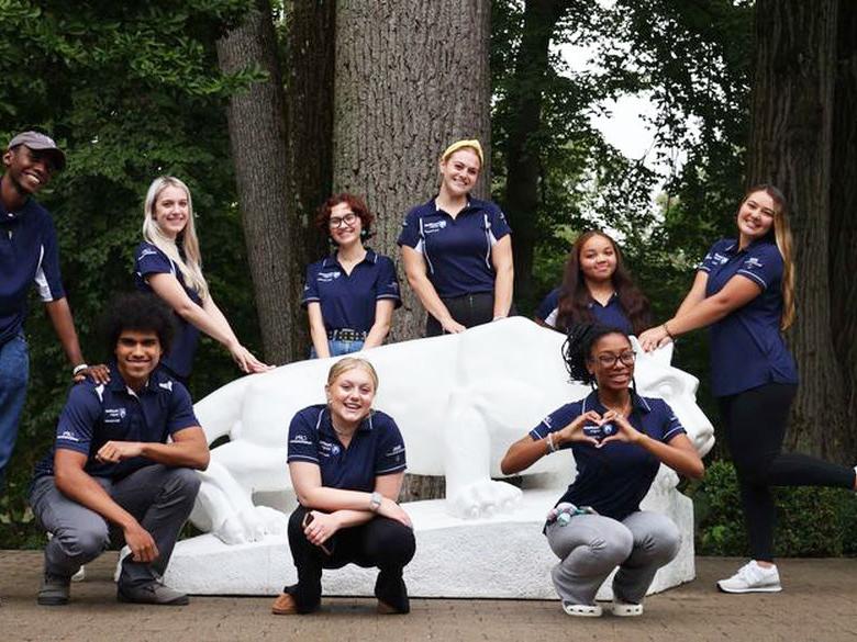 CAPS 2023 Peer Counselors around the Lion Shrine